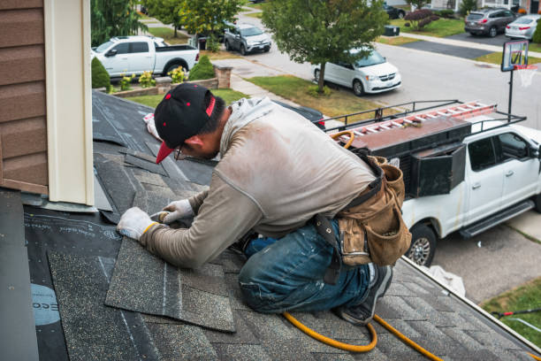 Professional Roofing technician working in Hanson, MA